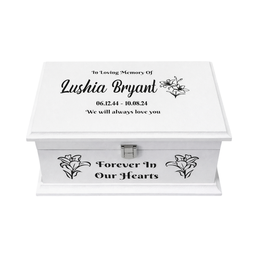White memory box with personalised text and floral designs on a white background