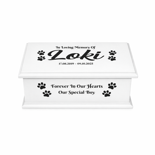 White pet memorial box with personalised text and paw prints on a white background
